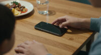 Column | Miss Manners: When A Dinner Guest Won’t Put The Phone Away